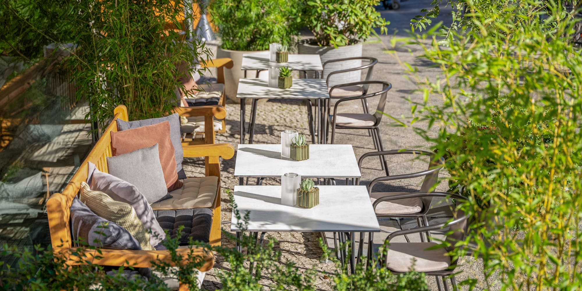 a tables and chairs outside on a sidewalk