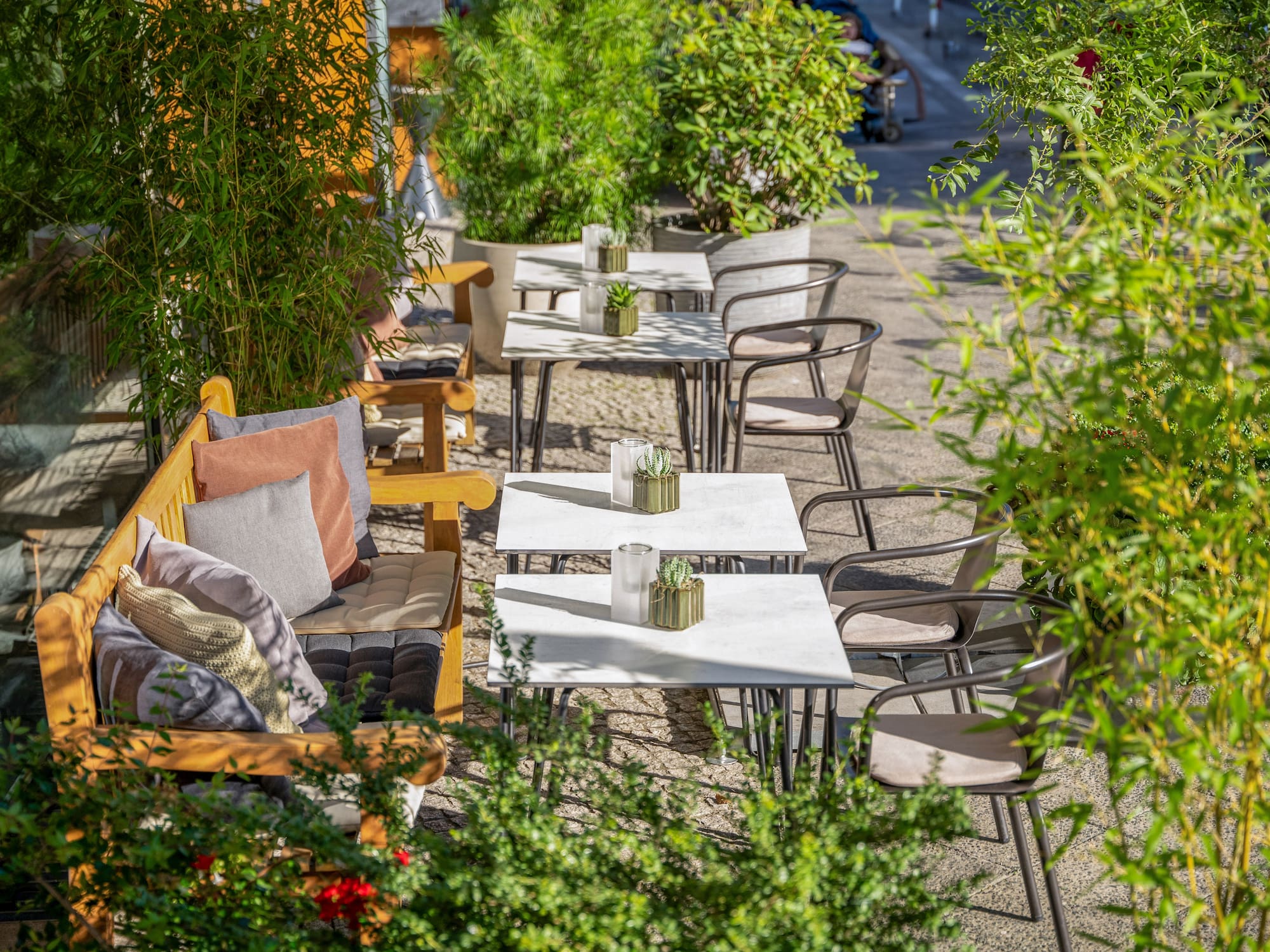 a tables and chairs outside on a sidewalk