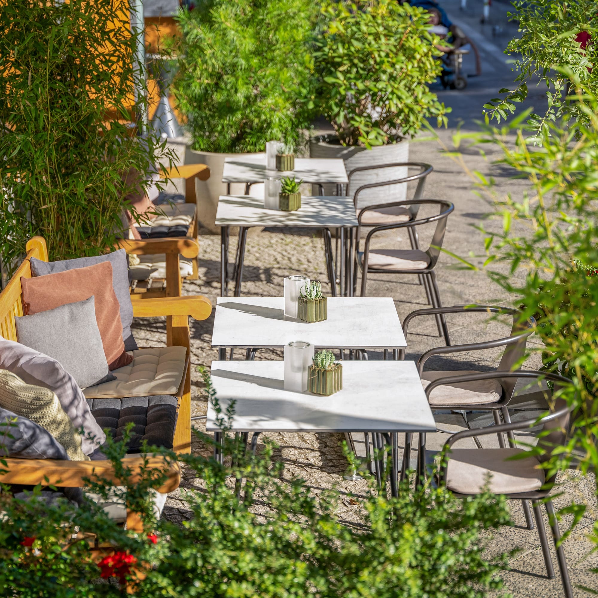 a tables and chairs outside on a sidewalk