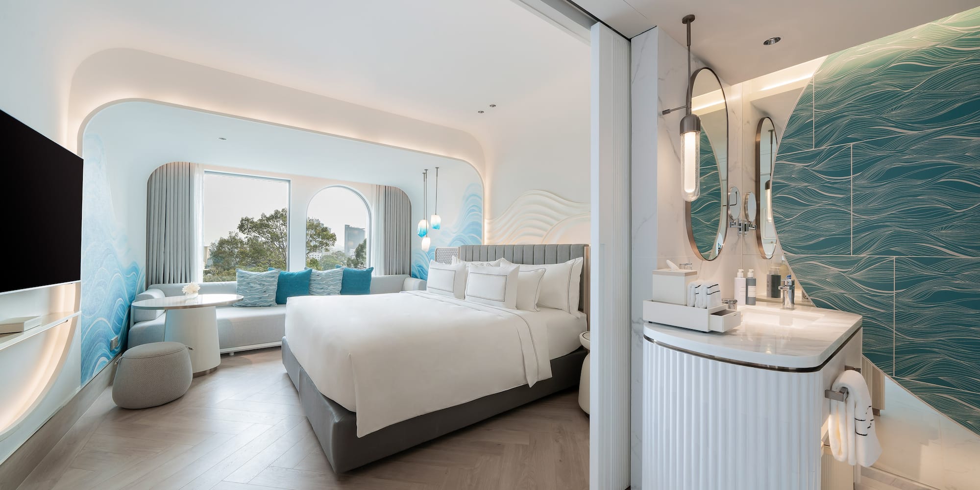 a room with a bed and a sink