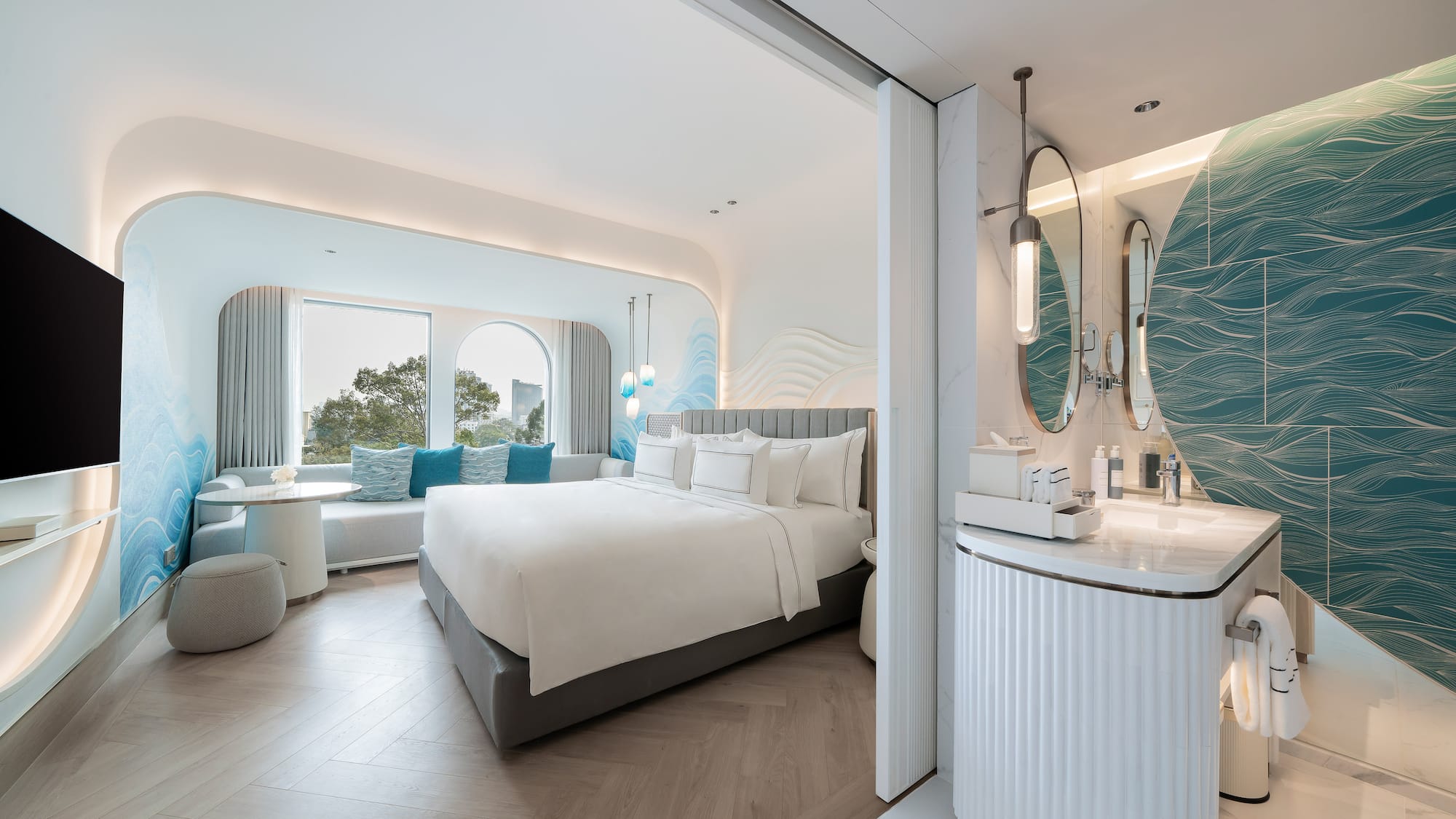 a room with a bed and a sink