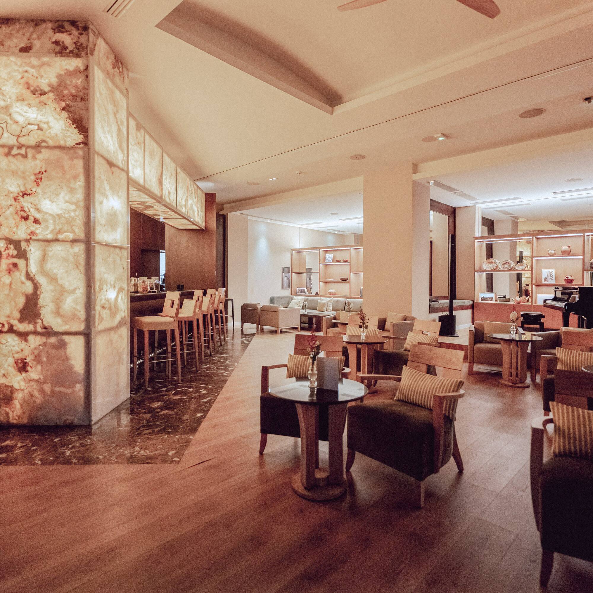 a room with tables and chairs