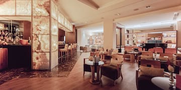 a room with tables and chairs