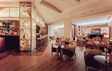 a room with tables and chairs