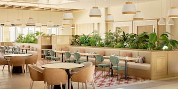 a room with tables and chairs