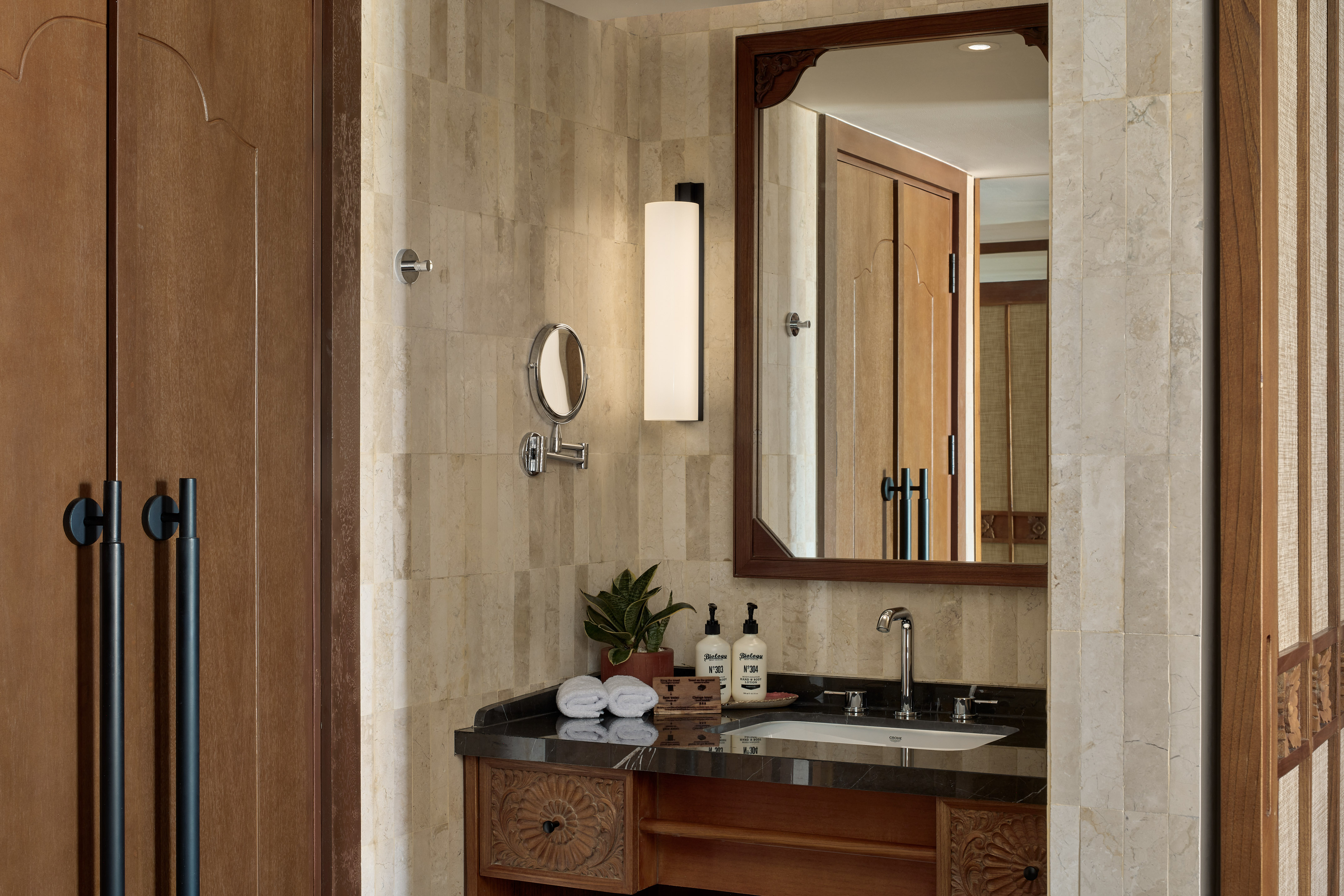 a bathroom with a mirror and sink