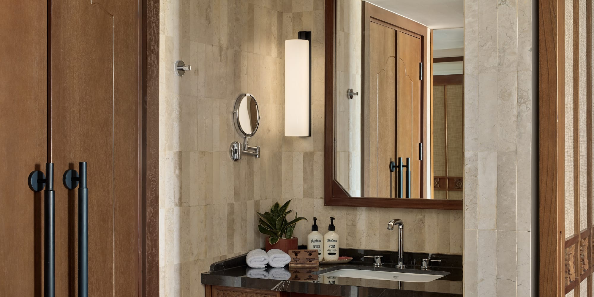 a bathroom with a mirror and sink