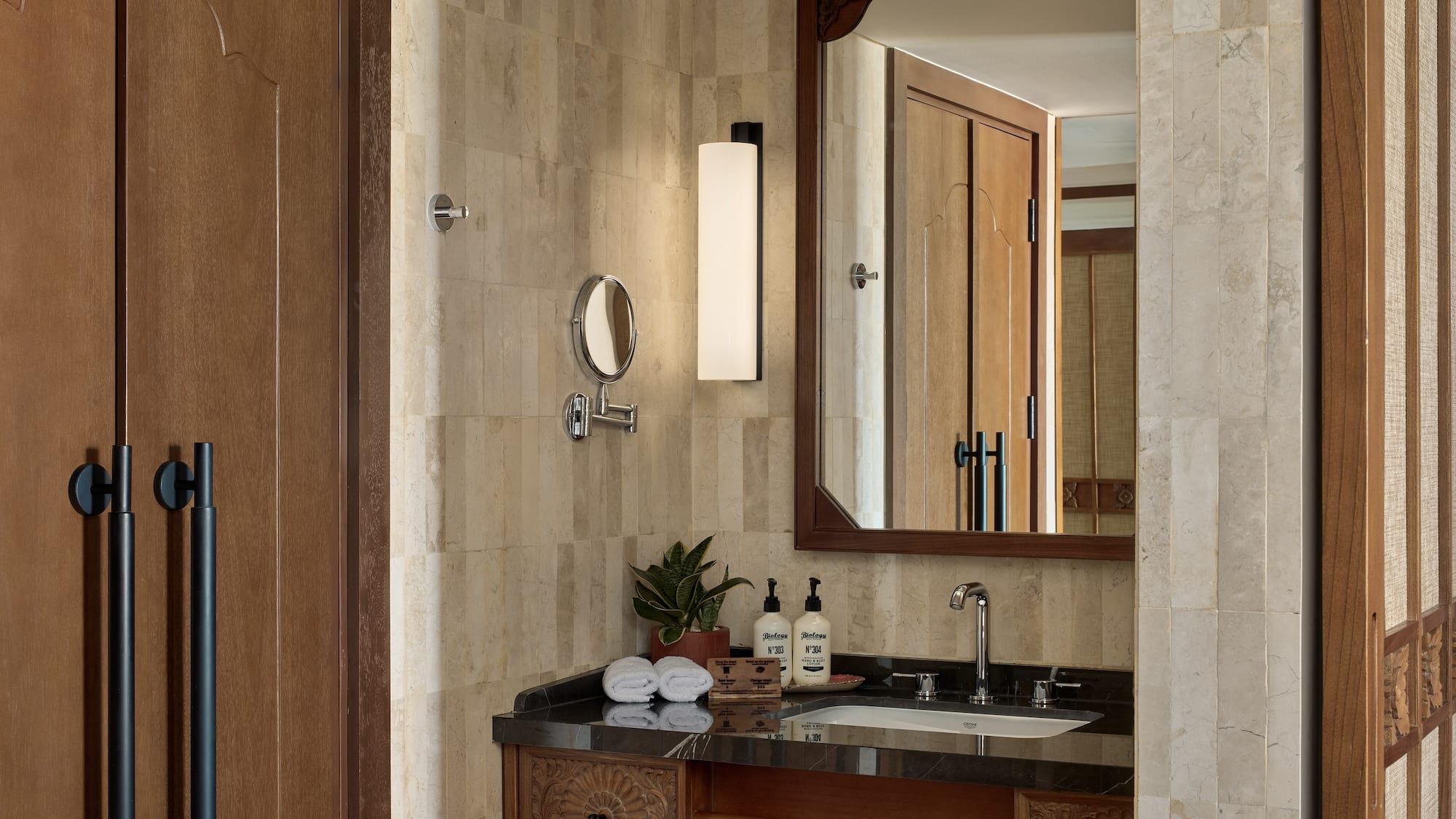 a bathroom with a mirror and sink