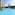 Bright blue resort pool, modern hotel, palm trees, sunny sky.
