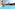 Bright blue resort pool, modern hotel, palm trees, sunny sky.