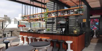 a room with tables and stools