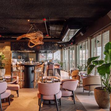 a restaurant with tables and chairs