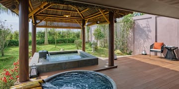 a hot tub and a wooden deck