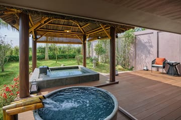 a hot tub and a wooden deck