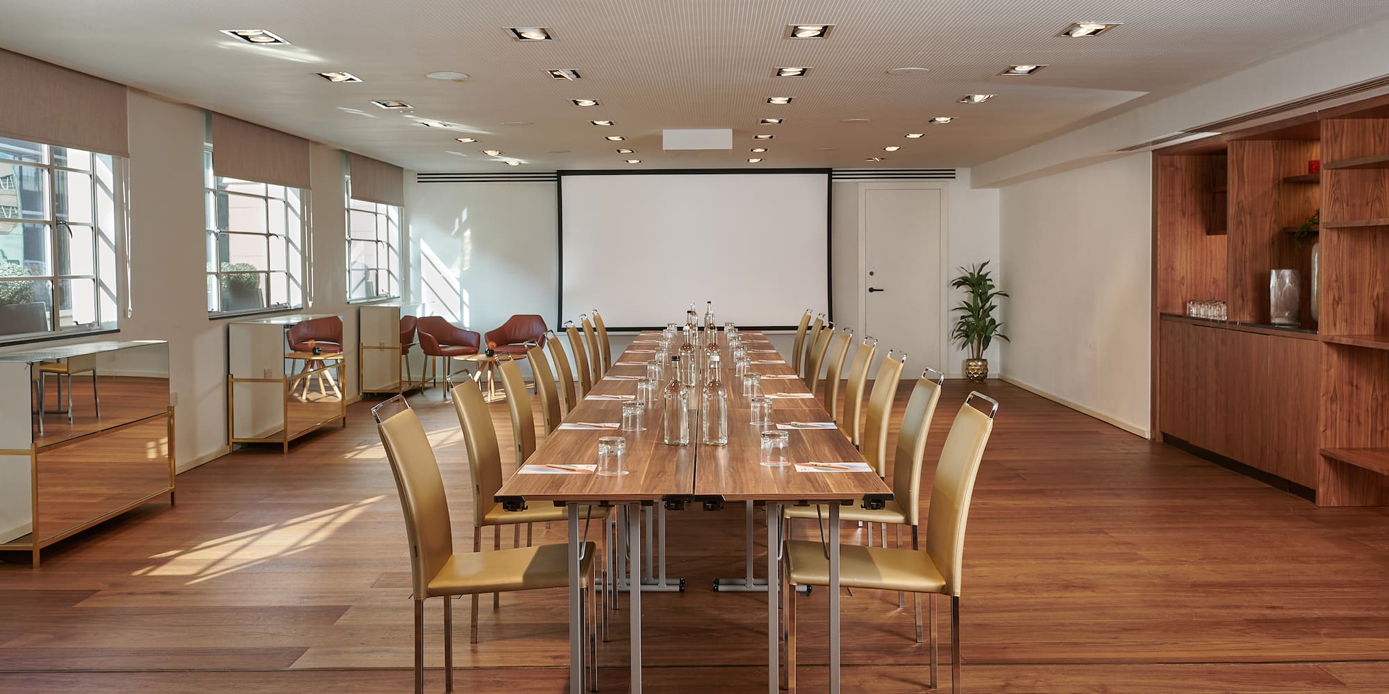 a room with a table and chairs