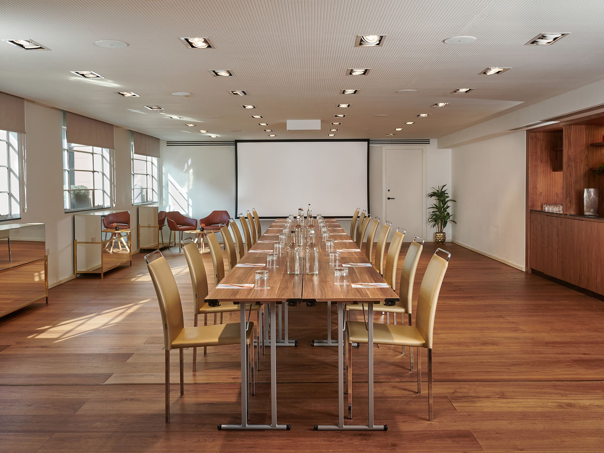 a room with a table and chairs