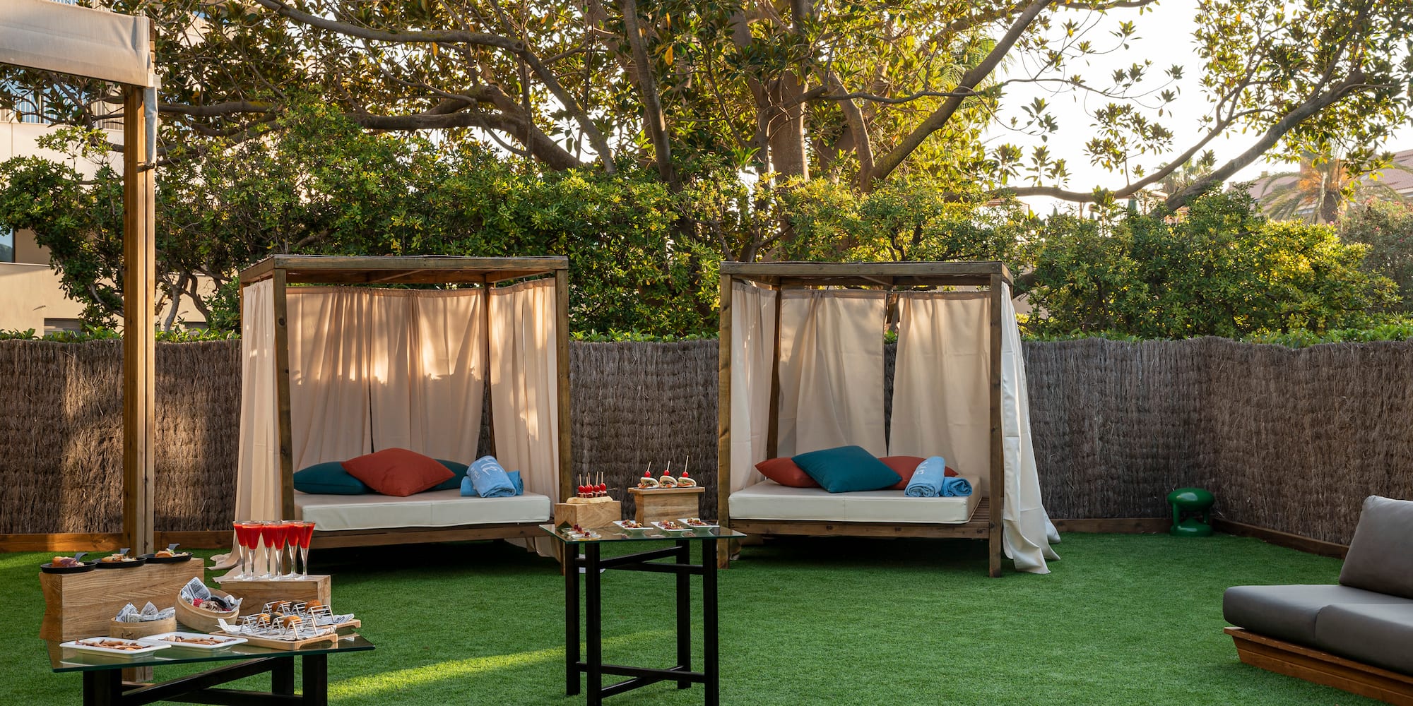a group of beds on a grass field