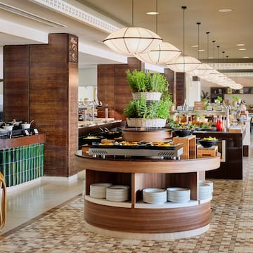 a buffet line with food on the counter