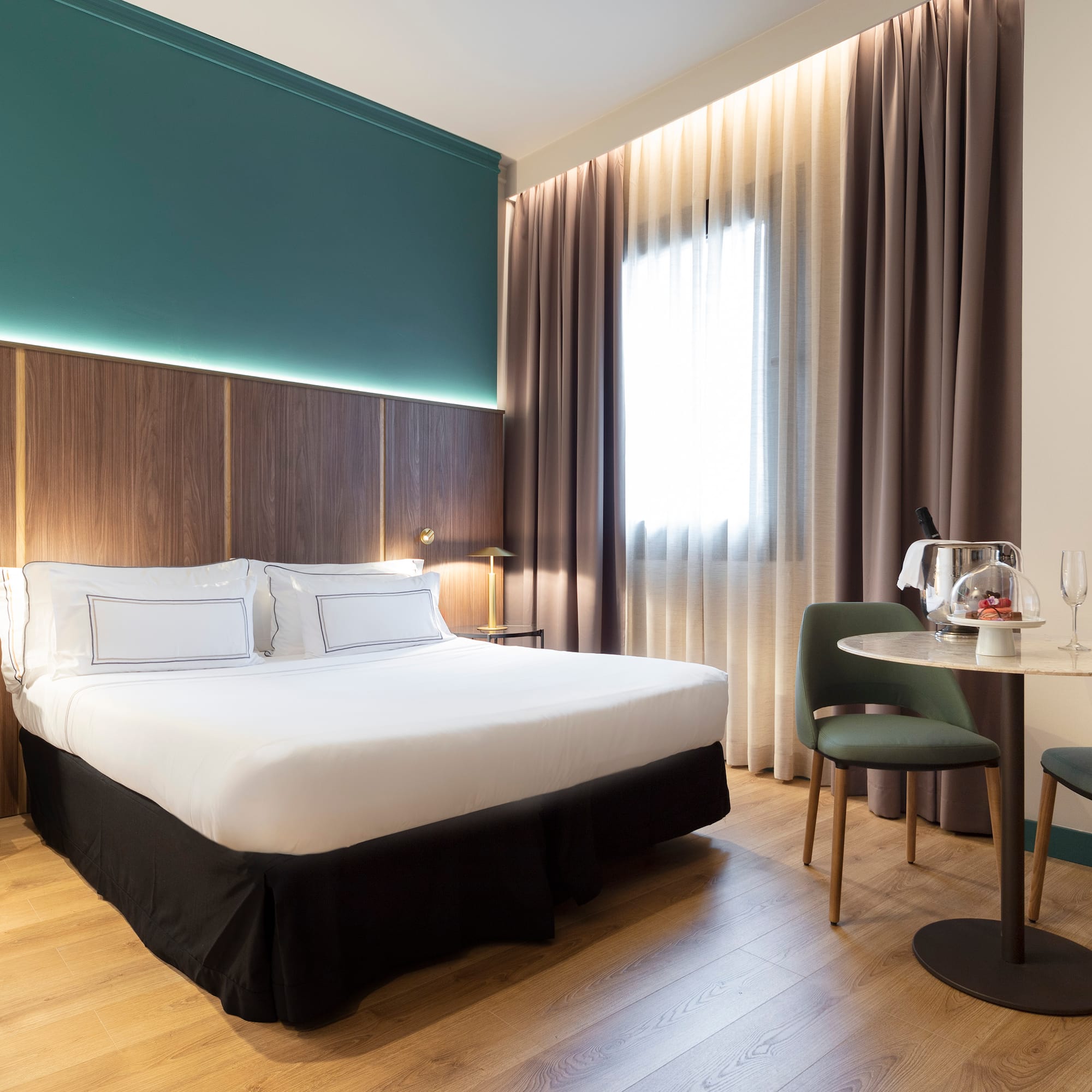 a room with a bed and a table