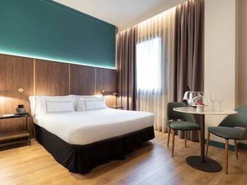 a room with a bed and a table