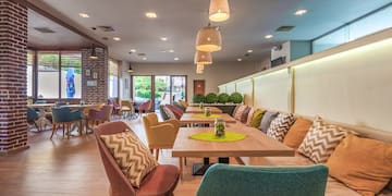 a room with tables and chairs