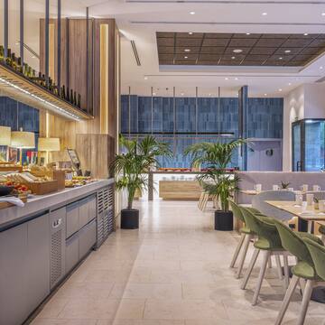 a restaurant with tables and chairs