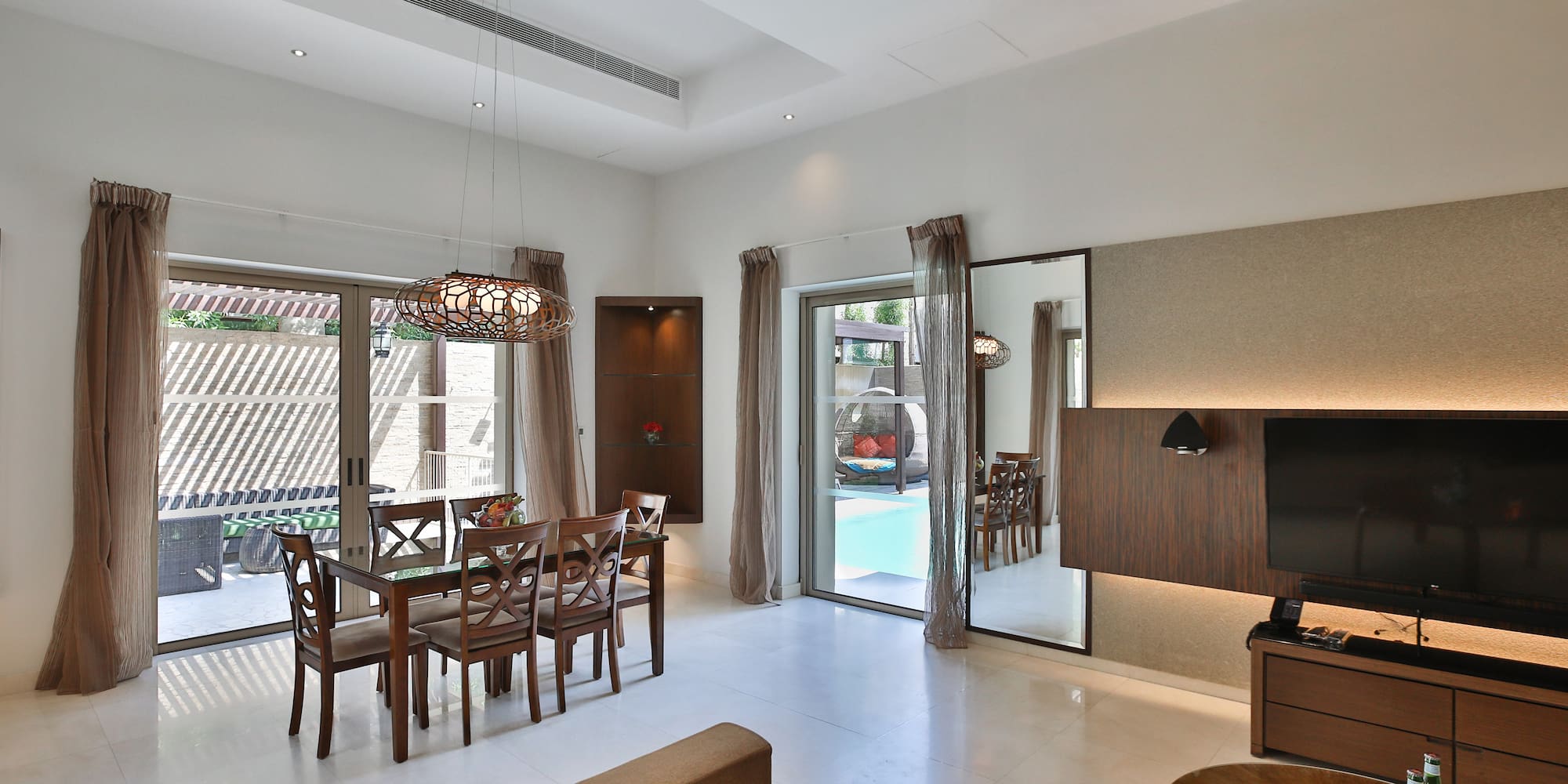 a room with a table and chairs