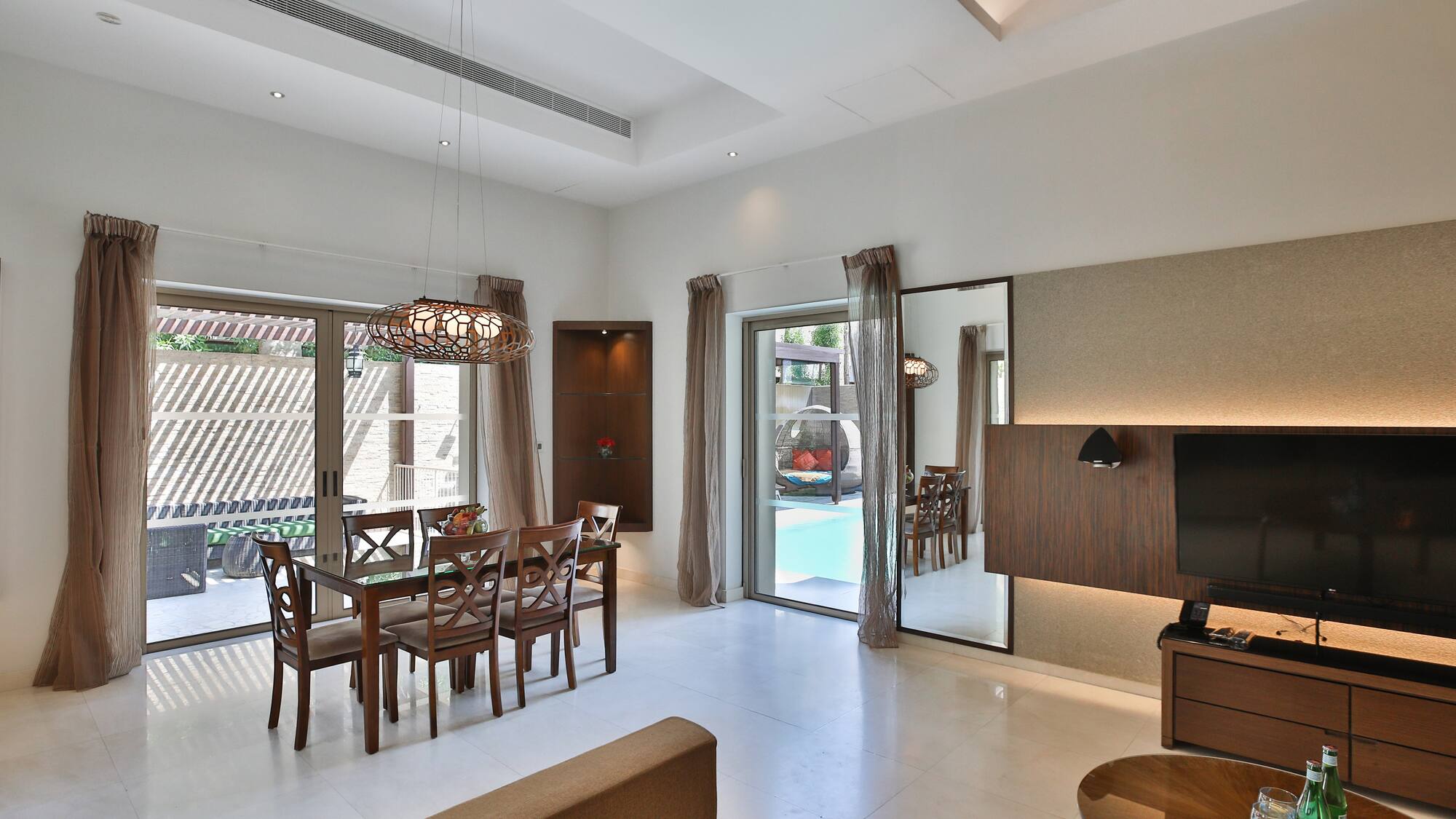 a room with a table and chairs