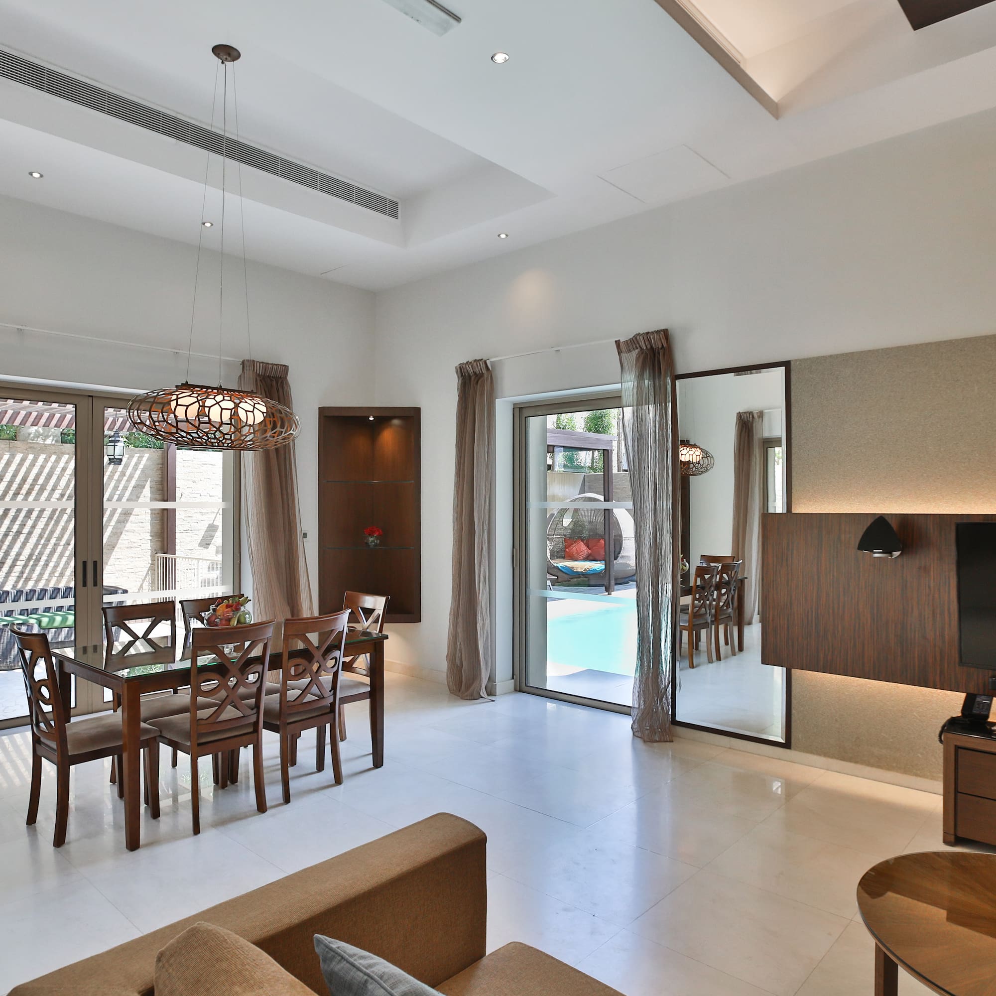 a room with a table and chairs