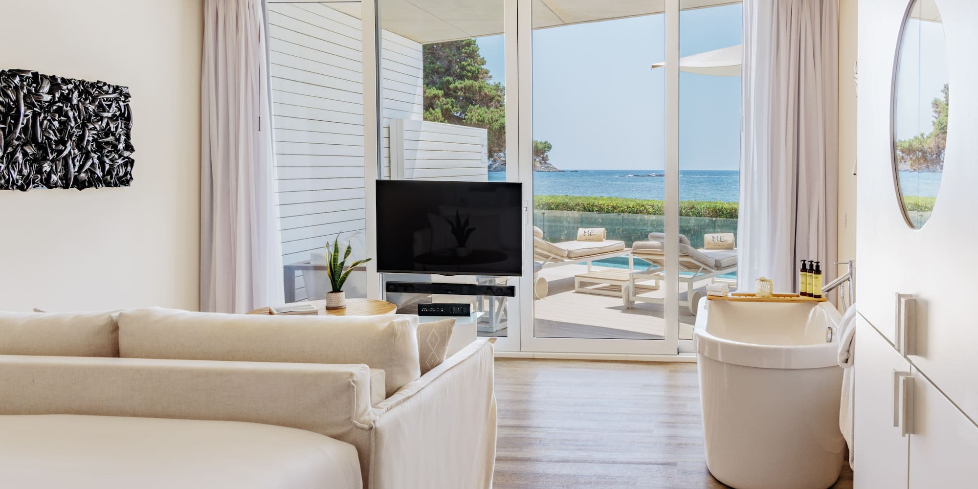 a room with a television and tub