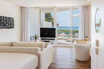 a room with a television and tub