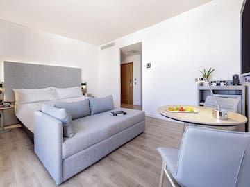 a room with a bed and a table