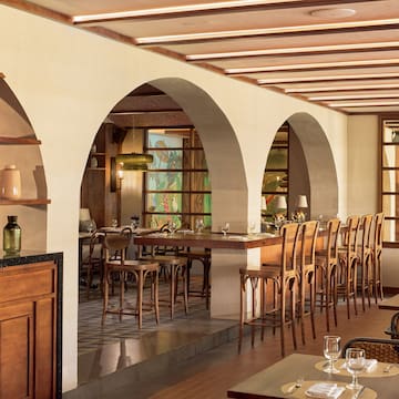 a room with a table and chairs