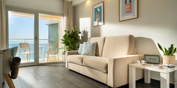 a couch in a room with glass doors