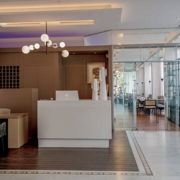 a reception desk in a hotel