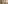 Neutral-toned hotel bathroom with glass shower, modern vanity, and closet storage.