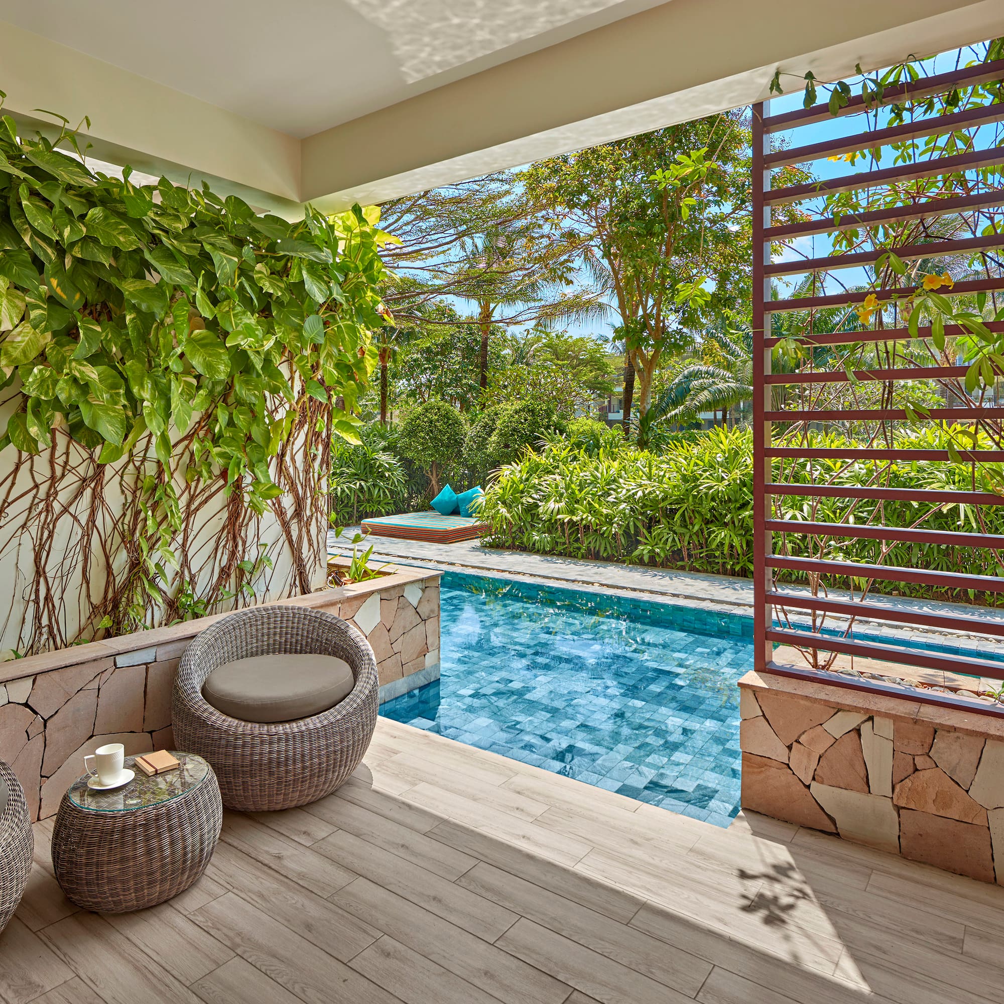 a pool with a chair and a table