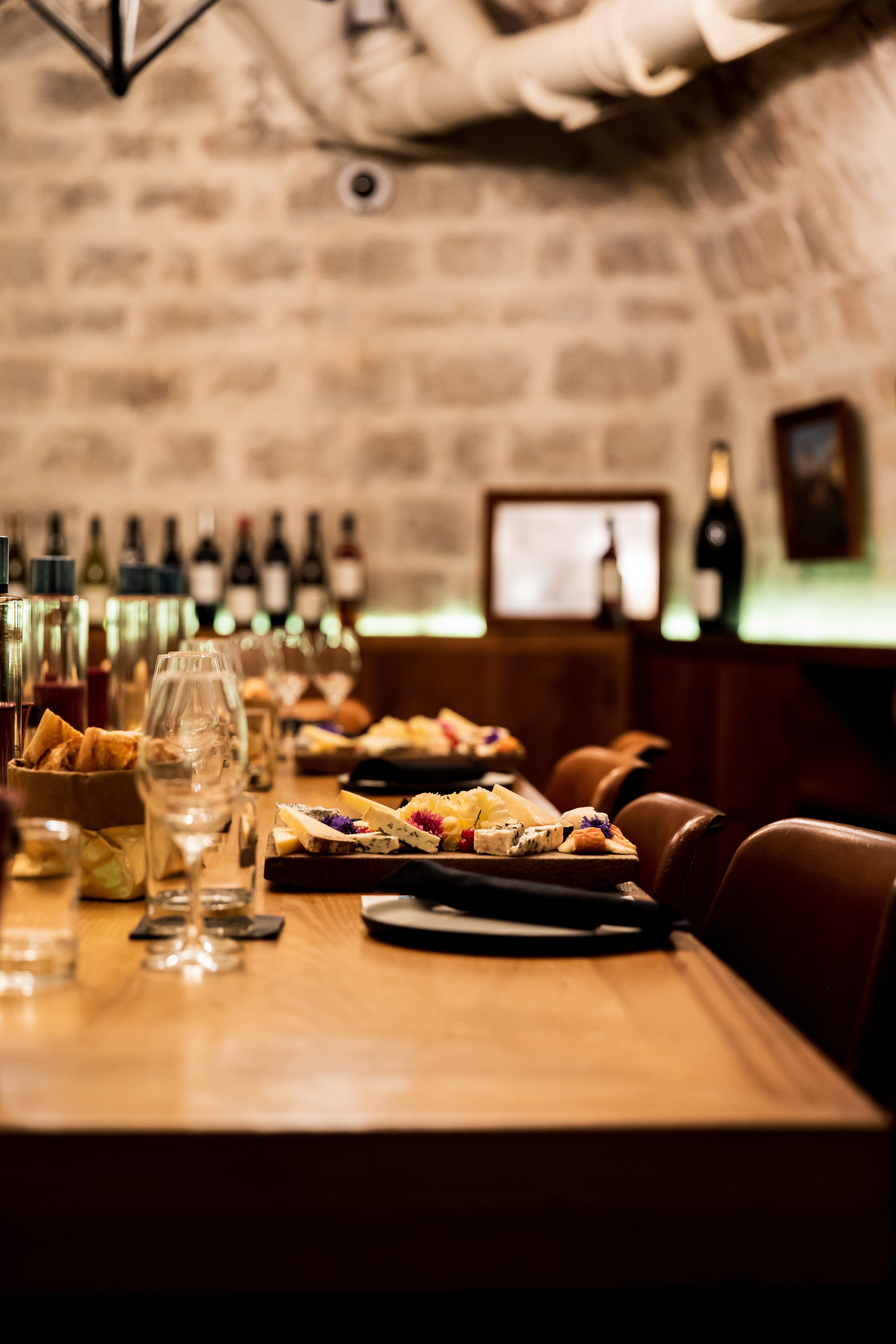 a table with food and wine glasses on it