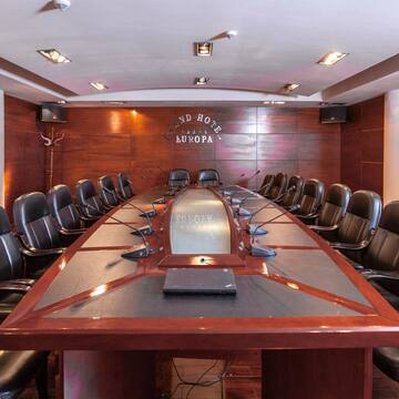 a conference room with chairs and a table