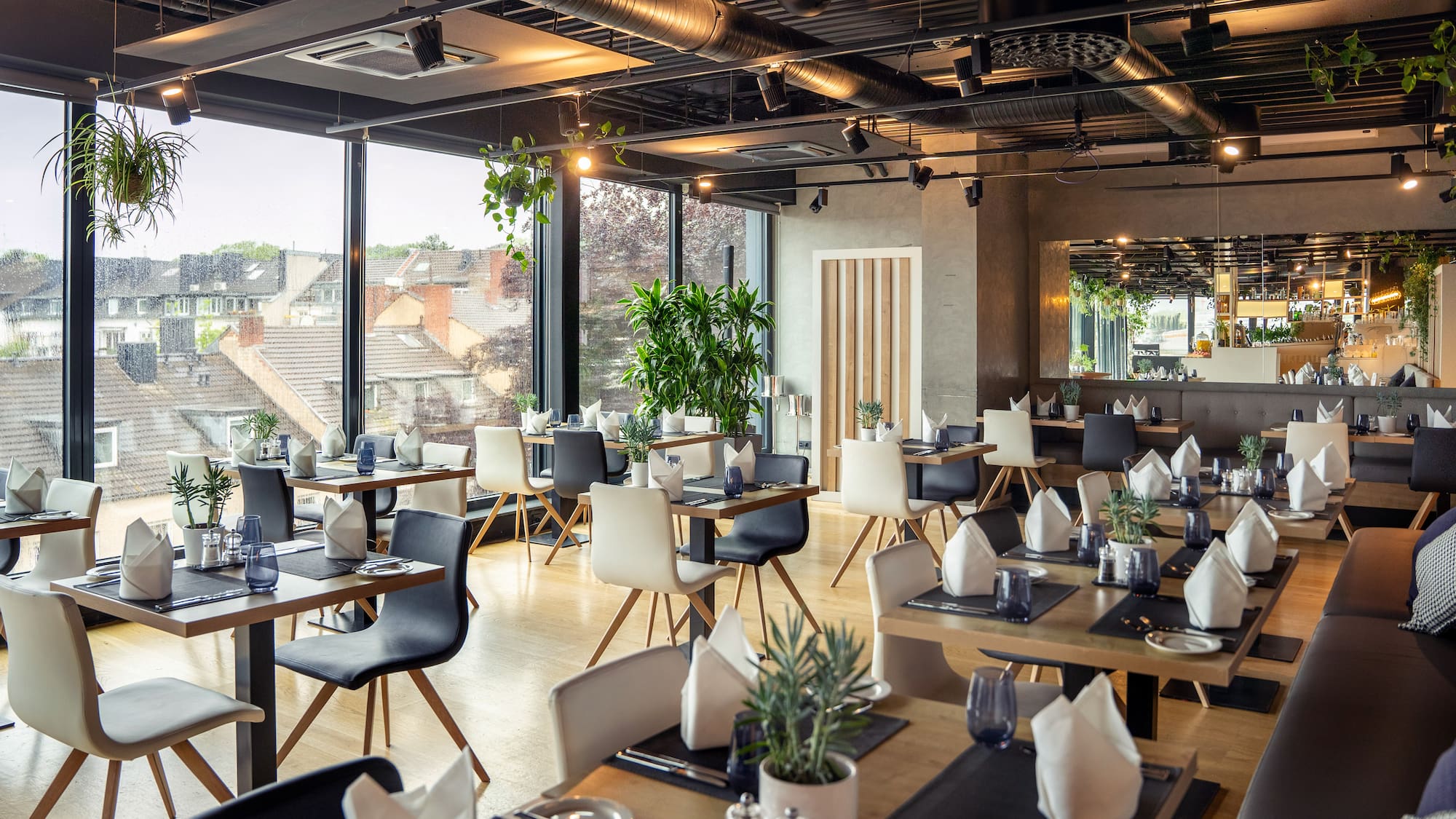 a restaurant with tables and chairs