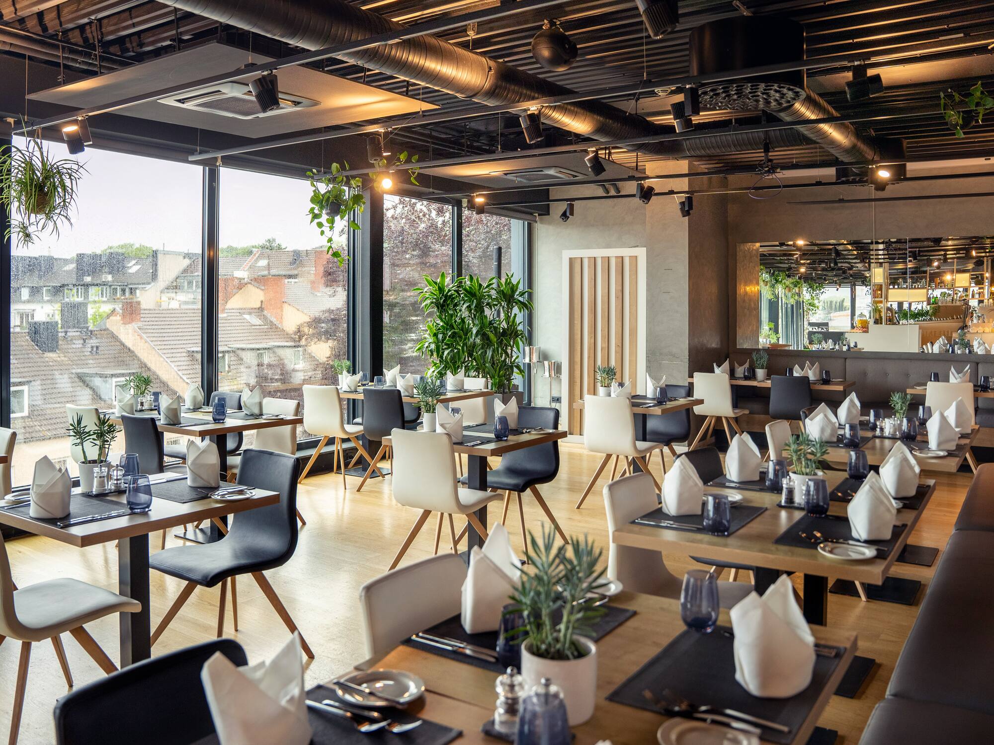 a restaurant with tables and chairs