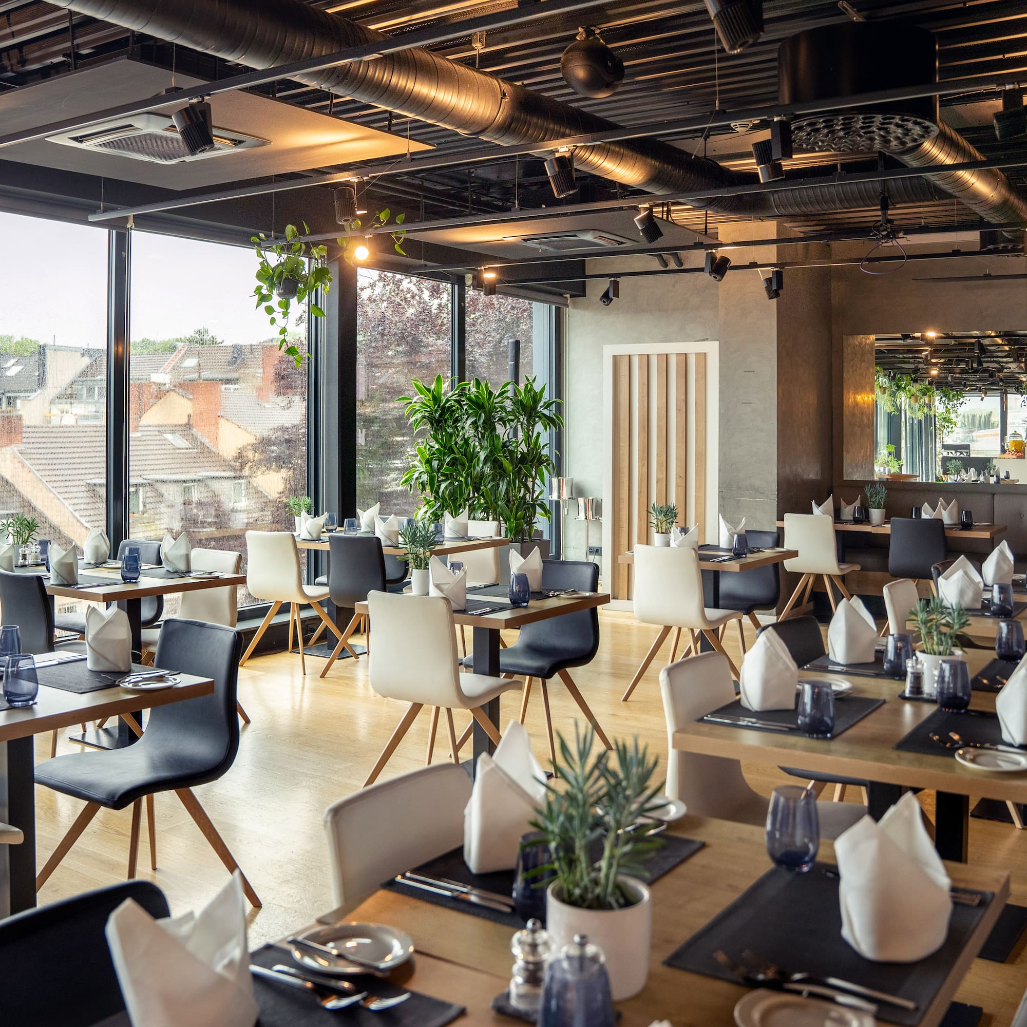 a restaurant with tables and chairs