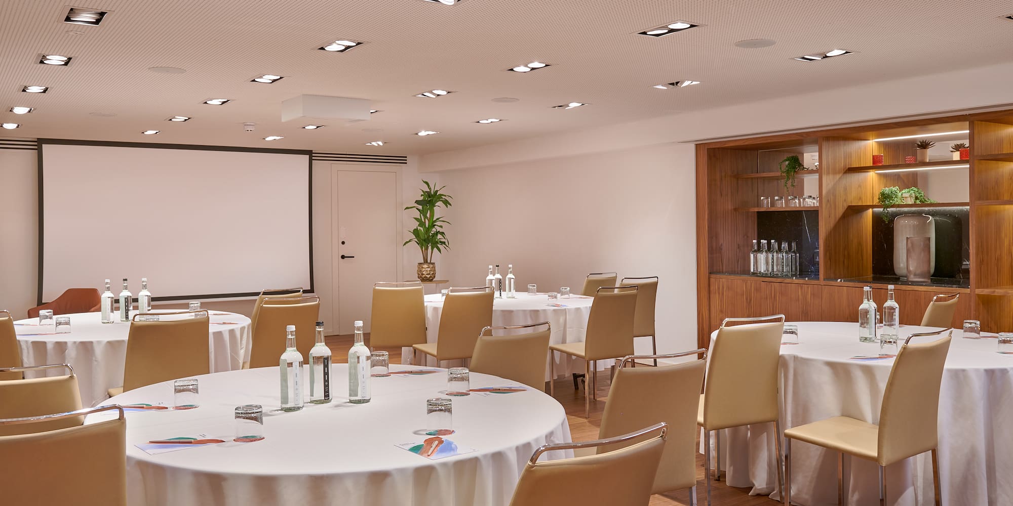 a room with tables and chairs