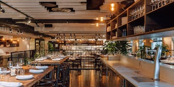 a restaurant with tables and chairs
