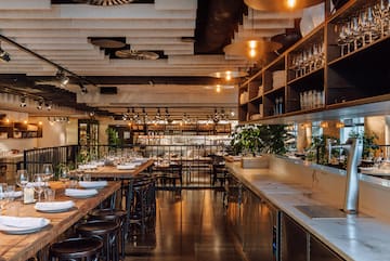 a restaurant with tables and chairs