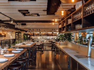 a restaurant with tables and chairs