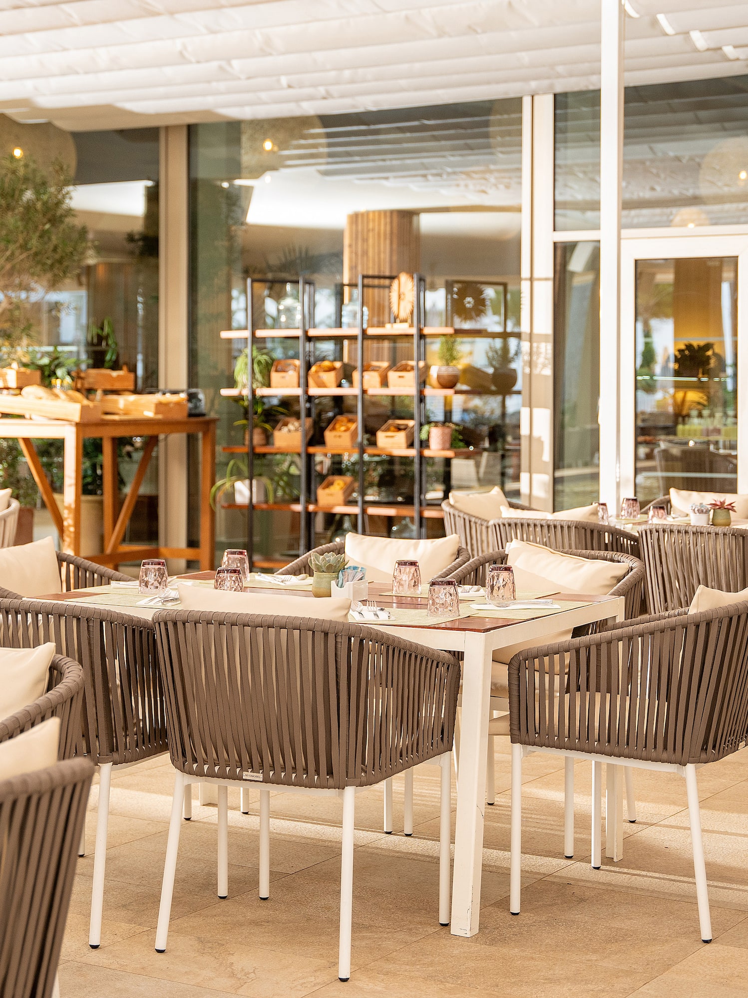 a restaurant with tables and chairs