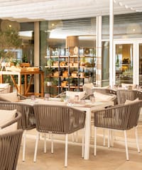 a restaurant with tables and chairs