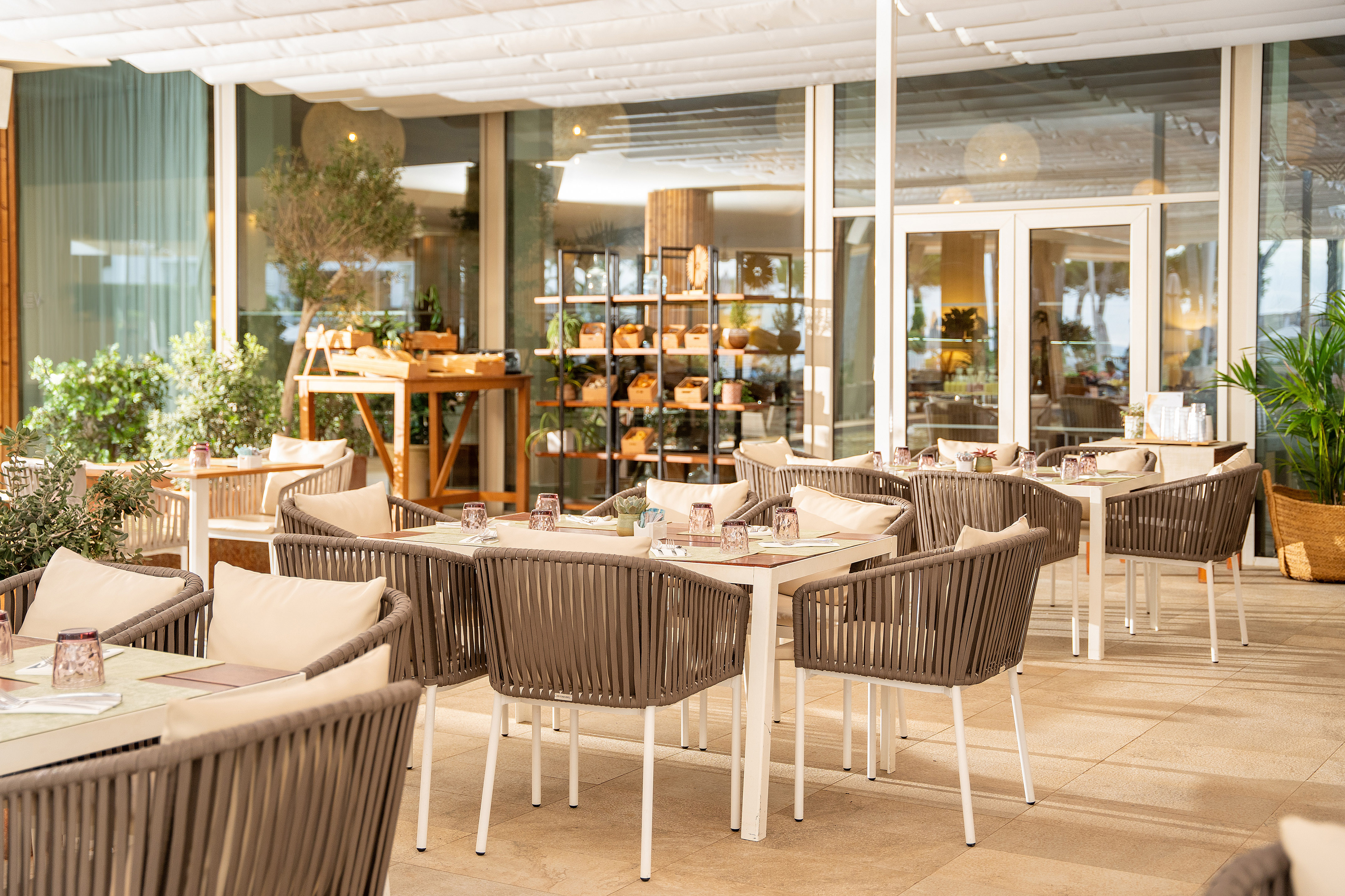 a restaurant with tables and chairs