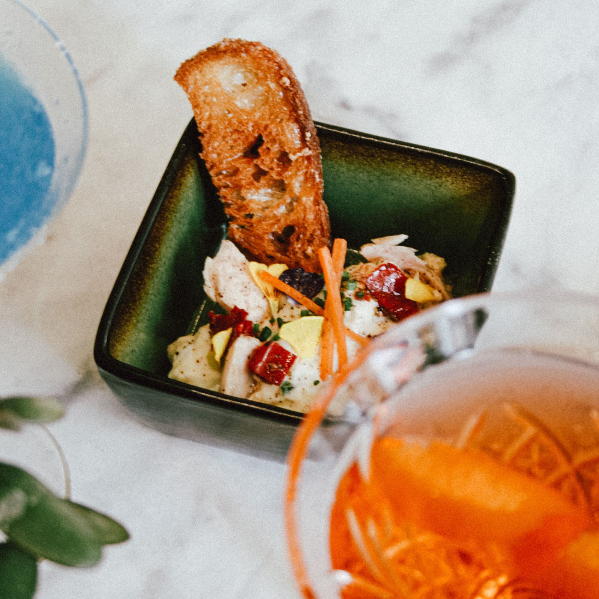 picnic basket on a blanket